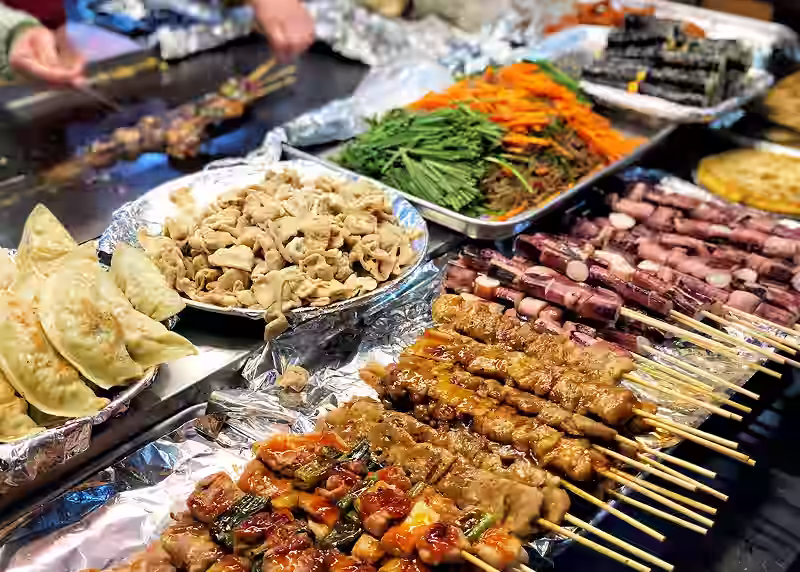 Skewers and grilled snacks at a Korean street food stall